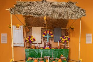 A bamboo structure that resembles traditional home ofrendas from the Yucatán