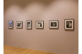 Photo of gallery wall with six black and white photographs