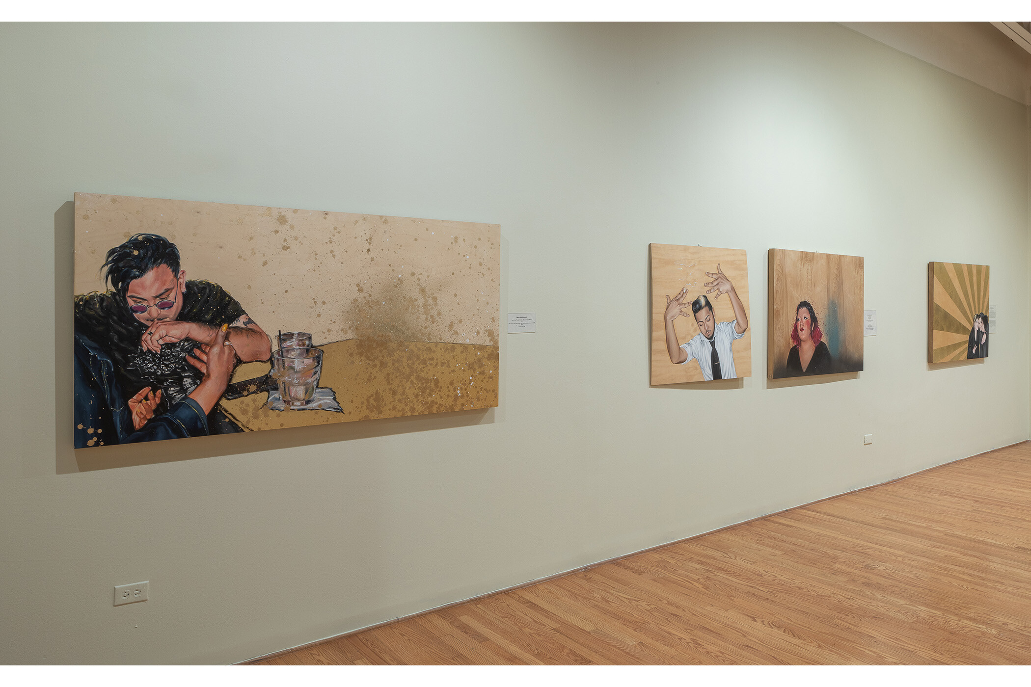 Image of gallery wall with four pieces of art