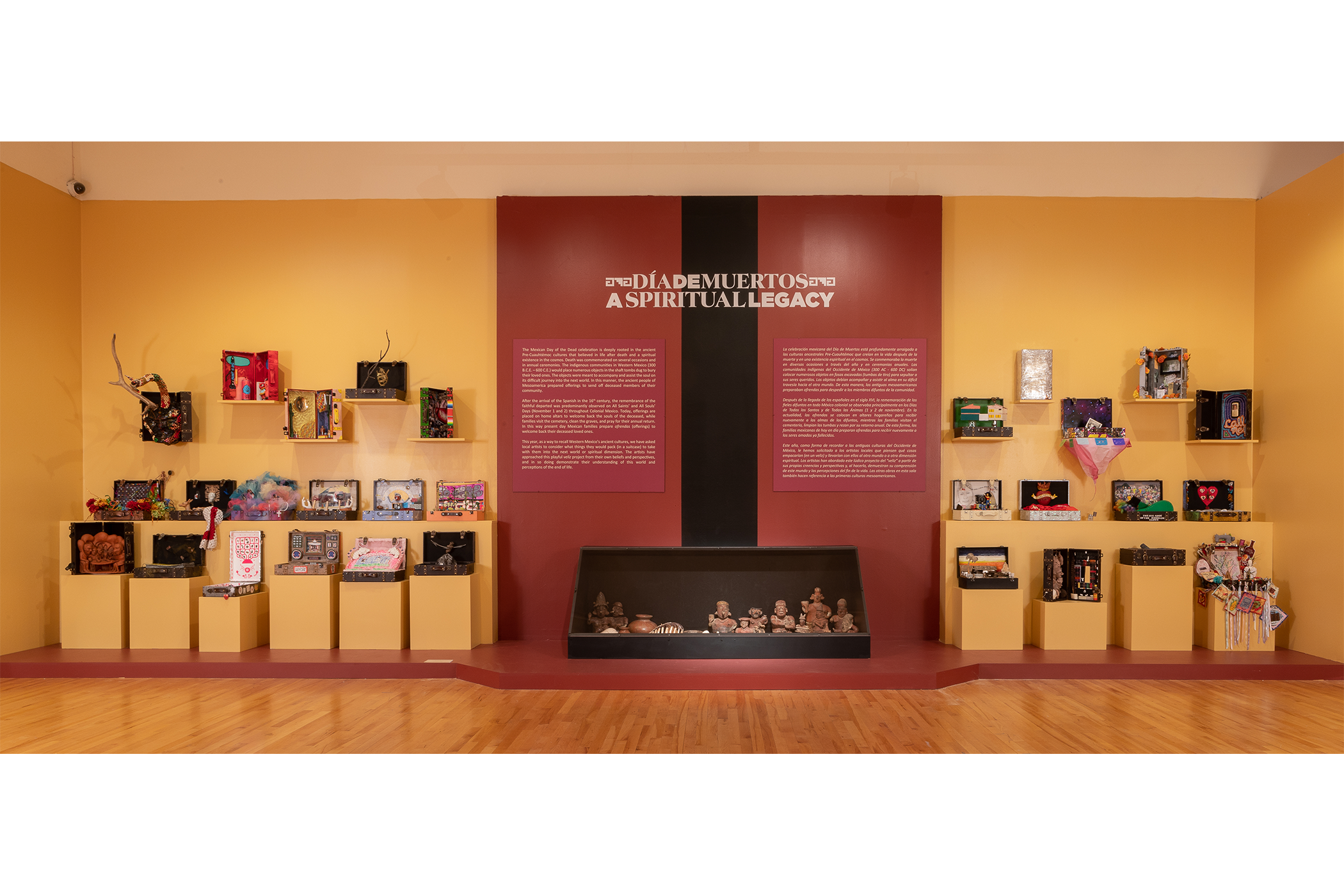A Display of suitcases; each decorated to each artists’ taste as to demonstrate what they would pack for the afterlife.