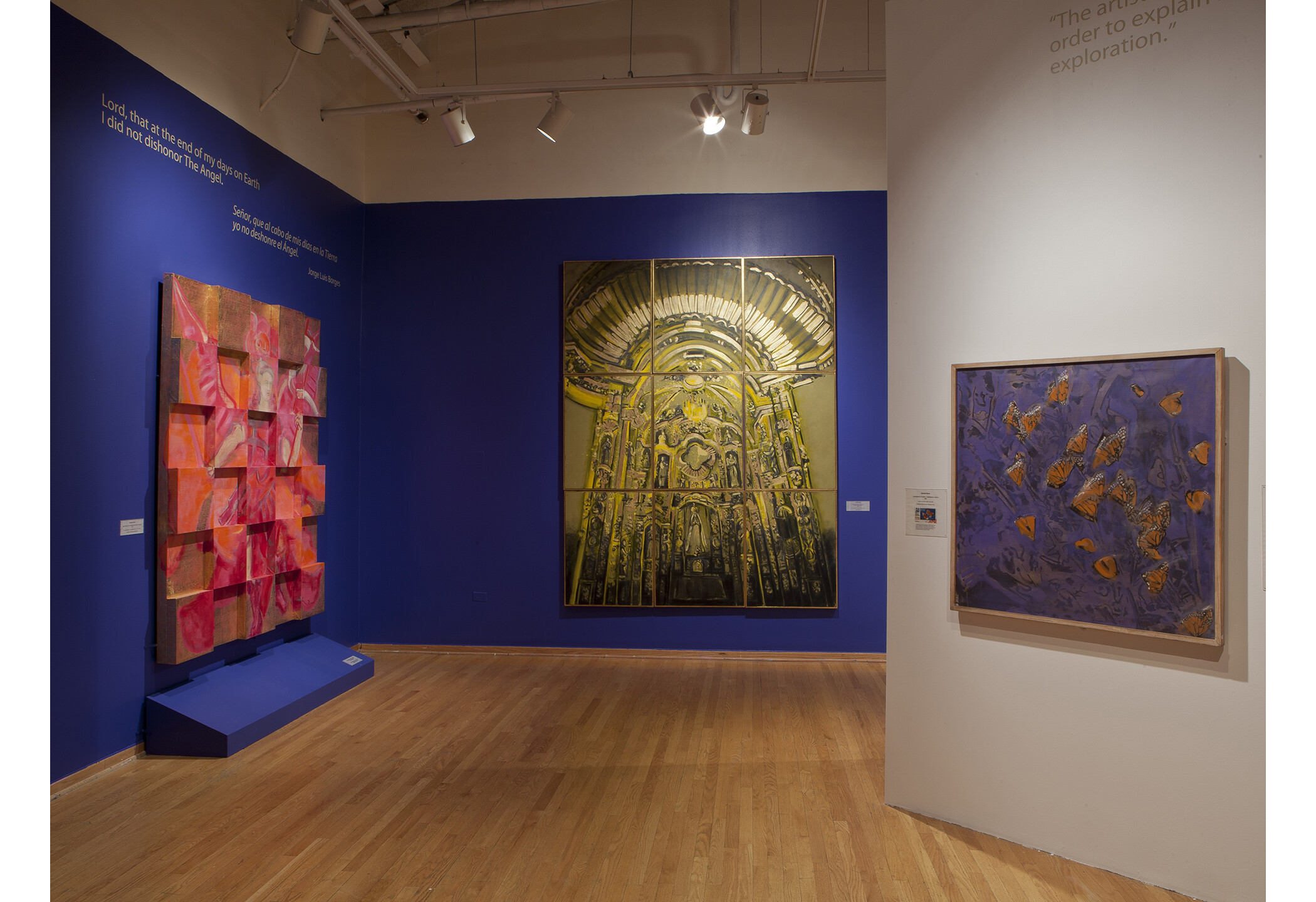 pink, orange, brown painting; a gold yellow monochrome art piece of a cathedral, and an abstract painting depicting monarch butterflies.