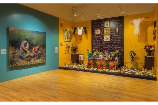 A painting by Arely Morales next to the  Ofrenda by Sandra Cisneros dedicated to her mother