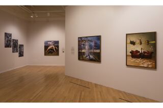 Image of three gallery walls with six hanging paintings total