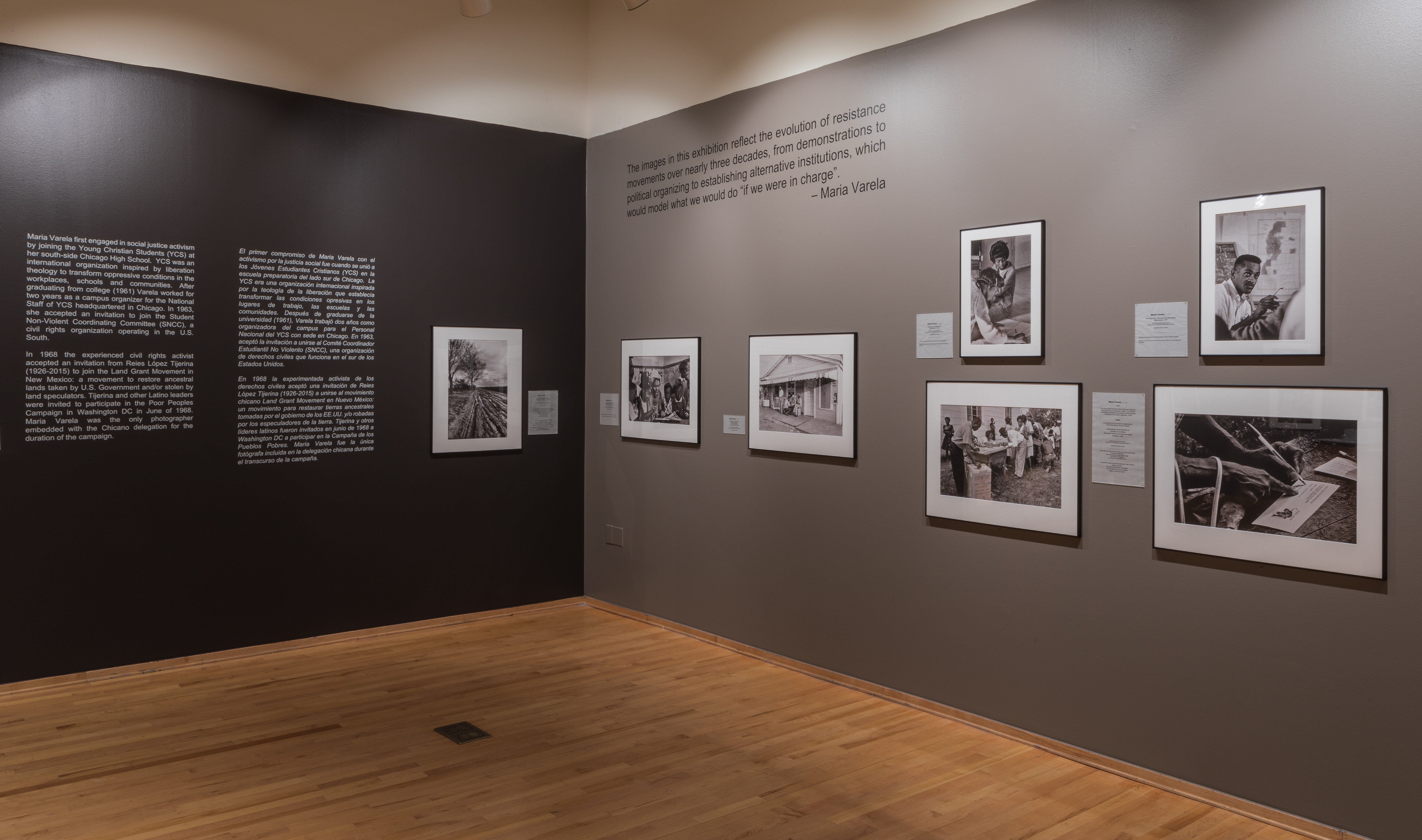 Photo of two gallery walls with text and black and white photographs