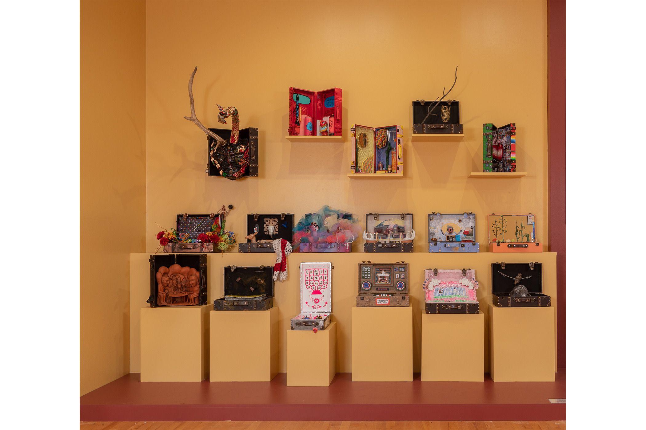 A detailed shot of the suitcases on display on the left side of the opening text.