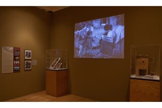 Photo includes a projected film, 3-dimensional art, and photography