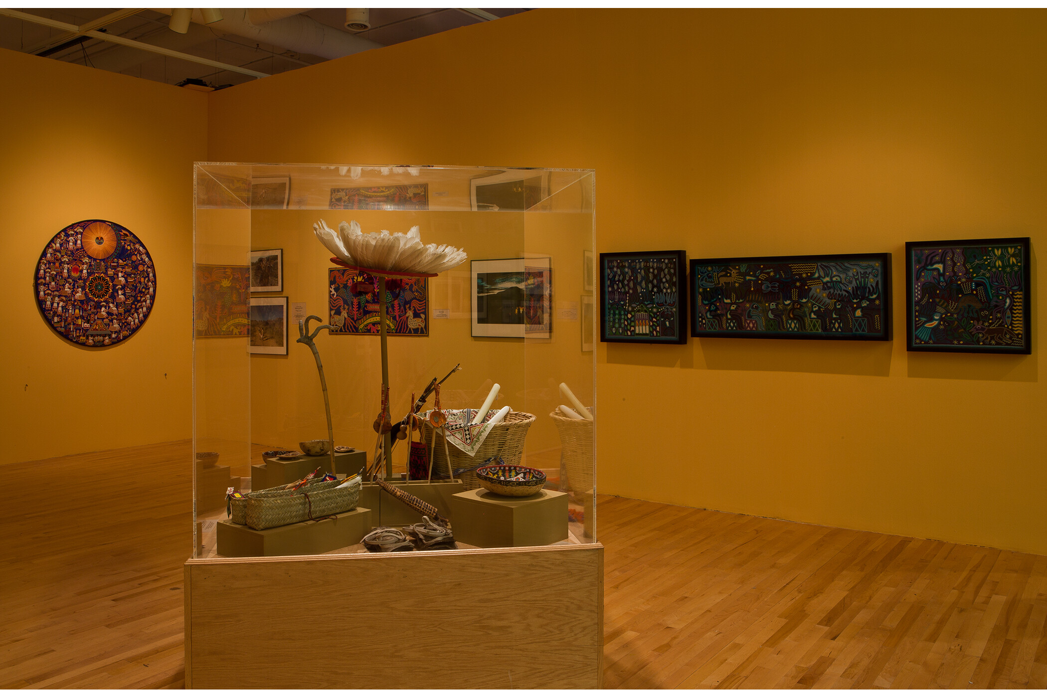 Photo of two gallery walls and 3-D art