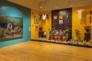A painting by Arely Morales is next to the Ofrenda by Sandra Cisneros dedicated to her mother