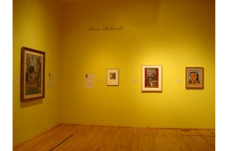 Gallery image of two walls. Left wall shows one painting, right wall shows three works of art and artist description