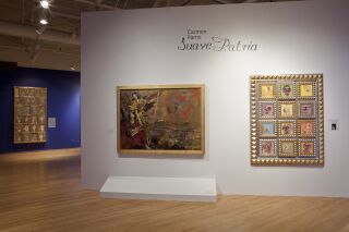 Photo of two gallery walls with three pieces of art visible