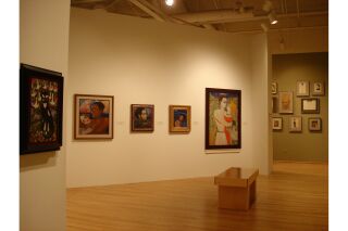 Wide angle of multiple gallery walls